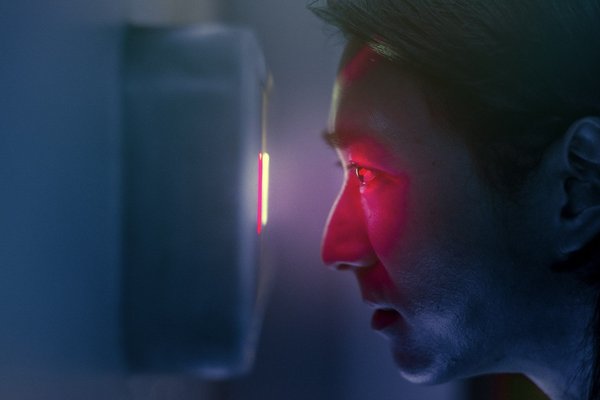 What are the legal considerations for UK businesses when using biometric data for employee authentication?